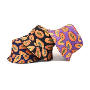 Three bucket hats with papaya print in blue, black, and purple on white background