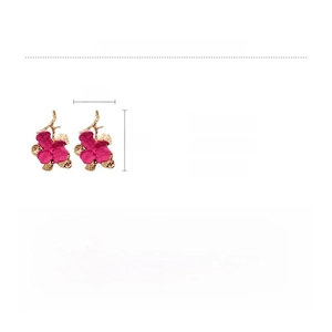 Detailed view of magenta flower earrings with golden branches, measuring 5x3 cm and 21.9g
