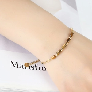 18K gold-plated paperclip chain bracelet with tiger eye beads and brand pendant