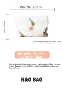Detail of floral jacquard makeup bag with tulip pattern showing 26x18cm dimensions