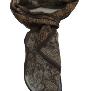 Vintage brown paisley scarf necklace with bohemian pattern on a soft fabric texture