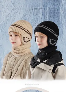 Close-up of kids winter knit hat and neck warmer set with thick warm fleece lining
