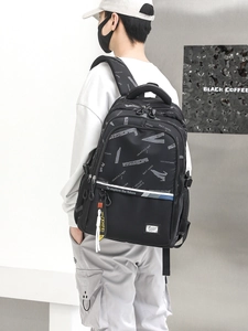 Men's black backpack with geometric print featuring large capacity and ergonomic straps