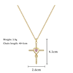 Detail shot of gold titanium necklace showing cross pendant dimensions and weight info