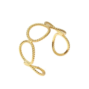 Detail view of 18k gold plated multi-layer twisted rope ring with textured metal finish
