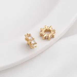 Close-up of 14K gold plated spacer beads with micro-set zircon for DIY jewelry making