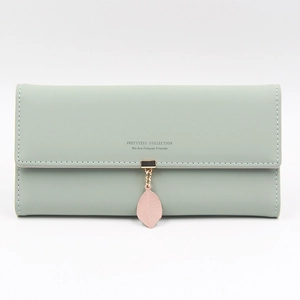 Long sage green PU leather wallet for women with leaf pendant and flap closure