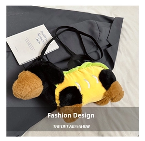 Close-up of a cute plush puppy crossbody bag with soft yellow coat and black nylon strap