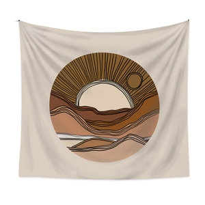 Detail of bohemian wall tapestry featuring abstract sun and mountain geometric patterns