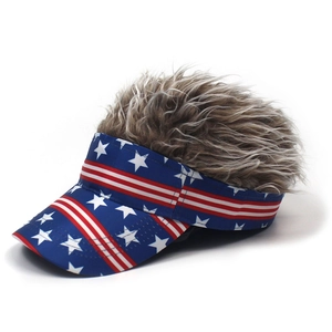 Detail view of American flag baseball visor with fluffy brown faux hair decoration