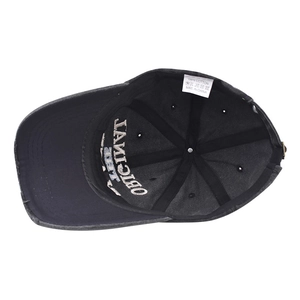 Detailed inner view of washed cotton baseball cap with 100% cotton label and embroidery