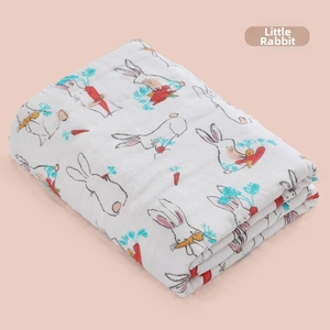 Detail of soft 6-layer cotton gauze baby blanket with cute rabbit and carrot pattern