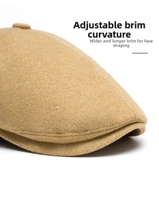 Detailed macro view showing the textured wool fabric and reinforced brim of this beret cap