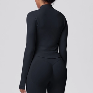 Rear view of black seamless compression workout set with slim-fit high collar jacket