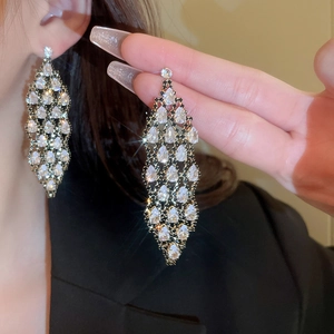 Elegant gold tassel drop earrings with rhombus mesh design and clear zircon stones