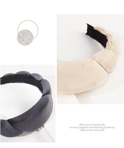 Detail of beige and dark grey padded velvet headbands with soft textured fabric