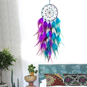 Minimalist Native American dream catcher wall hanging with blue and purple feathers