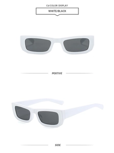 Detail view of white square sunglasses with black lenses showing front and side profile