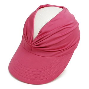 Close-up of pink pleated sun visor hat for women's outdoor beach sports and travel