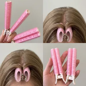 Pink hair root volumizing clip set for bangs styling and effortless lifting effect