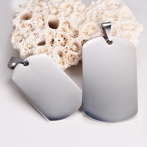 Polished rectangular stainless steel dog tags for custom engraving on white coral