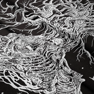 Close-up of tree of life and skull pattern on high-quality black textile tapestry