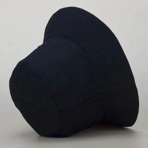 Detail view of the durable dark fabric texture on this reversible sun protection bucket hat