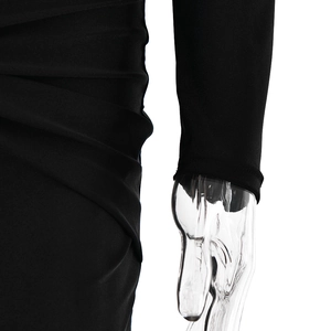 Detail shot of black dress waist ruching and long sleeve cuffs on mannequin