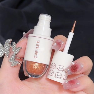 Pennello di precisione per ombretto liquido con glitter marrone dorato scintillante