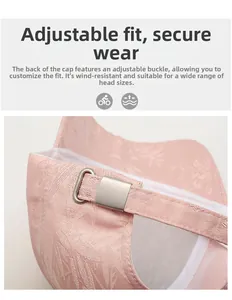 Detail der verstellbaren Metallschnalle auf rosa strukturiertem Baseballcap-Stoff