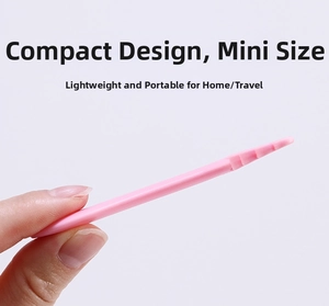 Detailed view of the pink silicone eyeliner helper tool, showcasing its portable slim design.