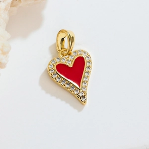 French vintage gold heart necklace with red enamel and sparkling crystal border on white