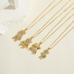 Chic 18K gold plated teddy bear zircon pendant necklaces on minimalist stone stand