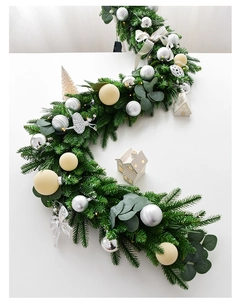 Close-up of 60cm Christmas wreath with pine needles, LED lights, and silver ornaments