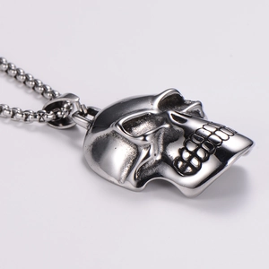 Polished stainless steel skull pendant necklace with intricate 3D punk design details