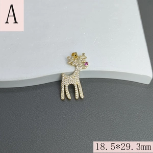 Detail of gold reindeer pendant with micro-pave crystals and pink gem, size 18.5x29.3mm