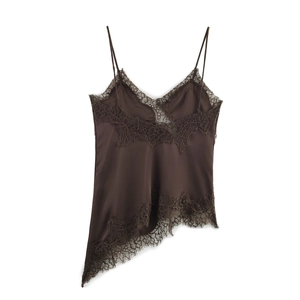 Detail of dark brown satin camisole featuring black eyelash lace trim and asymmetric hem