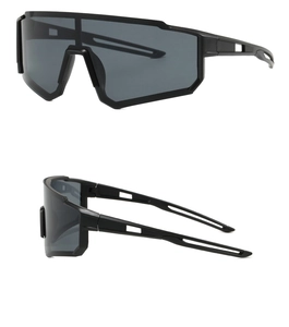 Detail of matte black sports sunglasses with aerodynamic hollow temples and wrap-around lens