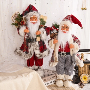 18-inch standing Santa figurines with red plaid coat, skis, and vintage lantern decor