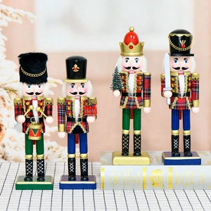 Set of four 10-inch wooden Nutcracker soldier ornaments with festive plaid patterns