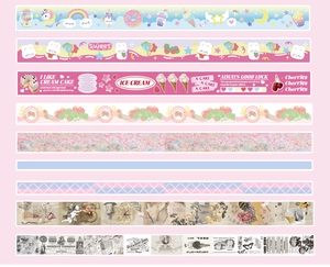 Detail view of colorful washi tapes with cute cartoon patterns and strawberry floral designs