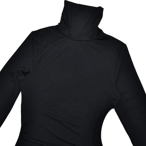Detail showing the mock neck collar and long sleeves of this black bodycon maxi dress
