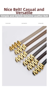 Macro view of genuine cowhide thin belts with golden wave-shaped metal buckles