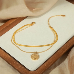 Double-layered gold-plated stainless steel anklet with snake chain and coin pendant