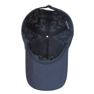 Navy blue breathable baseball cap with laser-cut ventilation holes and mesh lining