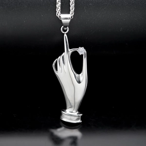 Polished silver 316 stainless steel hand gesture pendant with sparkling inset gemstone
