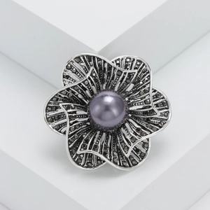 Vintage oxidized silver flower brooch with purple pearl and black rhinestones