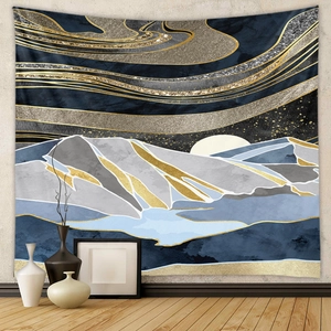 Detail of wall tapestry featuring abstract navy blue and gold mountain peaks landscape