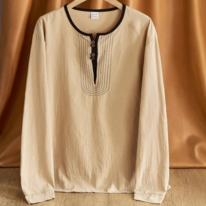 Vintage light beige linen blend long sleeve Henley shirt for men displayed on a wooden stand