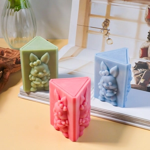Detailed 3D relief of cartoon rabbits and flowers on colorful silicone candle molds